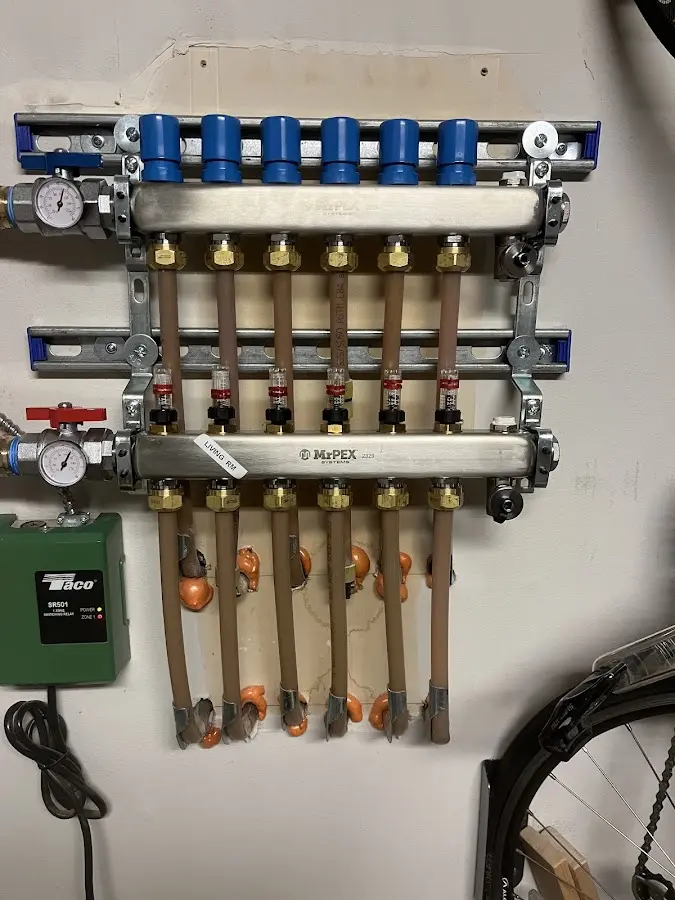 Plumber performing Water Heater Repair at a residential property in Sterling